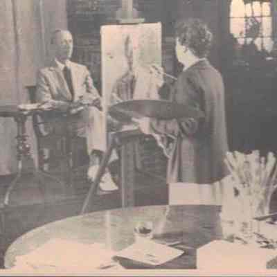 Mabel Norman Cerio painting in her Studio