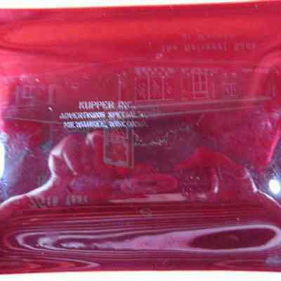 Back of black plate from The National Bank of Waupun 75th Year