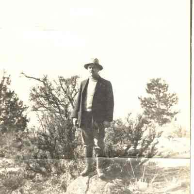 P. 115, Mr. Baum, Sr. standing on rock.