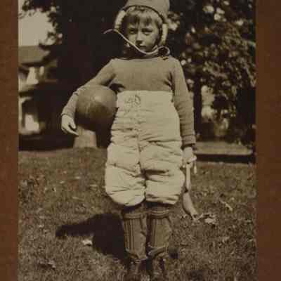 Photograph, J.A. Kastein Jr., Boy with Football
