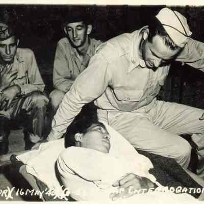 Photo of four men labeled May 16, 1945, Interrogation.
