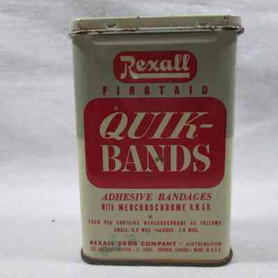 Metal container of bandages in firstaid kit.