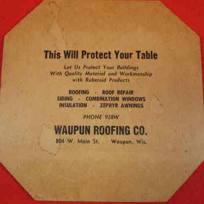 Back of trivet advertising Waupun Roofing Co.