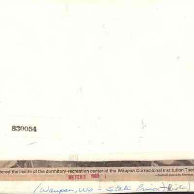 Info on back of photo of damage during riots