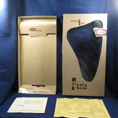 Box for hotwater bottle and syringe w/guarantees.