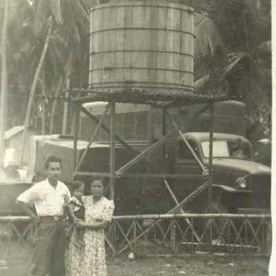 Photo of man, wonam and child during WWII.