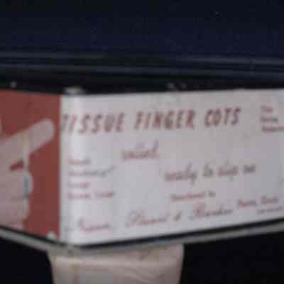 Box of tissue finger cots.