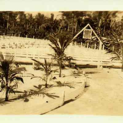 Picture from WWII ow what may be a cemetery. Looks like crosses in the backgroung.