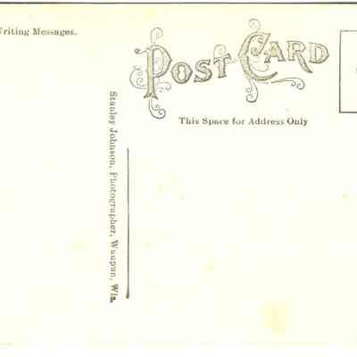 Back of photo postcard of Watertown Street, Waupun, WI