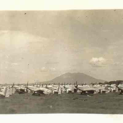 Large number of planes on the ground.
