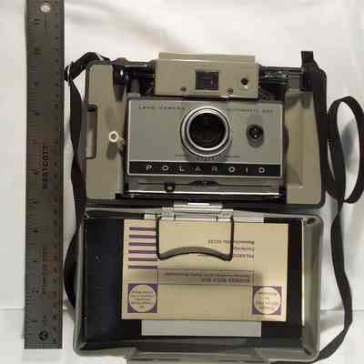 Polaroid camera 230