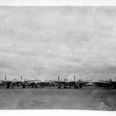 Large number of planes on the ground.