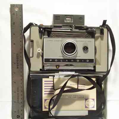 Polaroid camera 230
