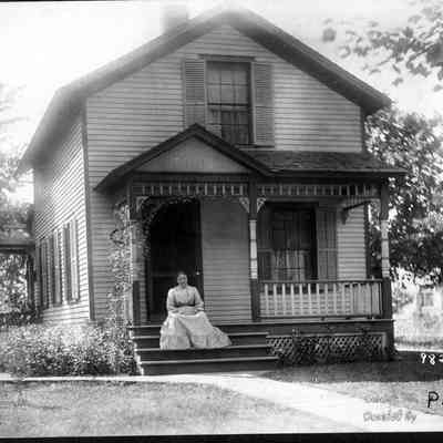 Woman on Porch, Photo by Alfred Stanley Johnson