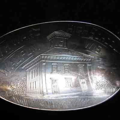 Engraved spoons depicting historical places in the Late 19th and eary 20th centuries.