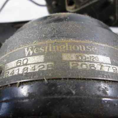 Westinghouse open face electric fan.