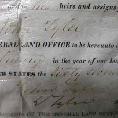 Handwritten name of President on land certificate