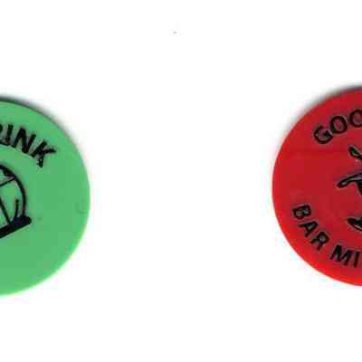 Backs of drink tokens from The Other Bar, Waupun, WI