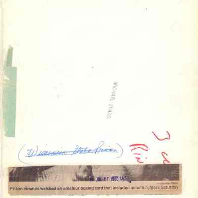 Info on back of boxing photo at Waupun prison
