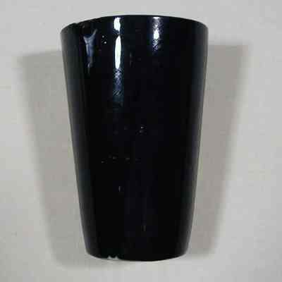 Cup with "Wisconsin State Prison at Waupun" on it.