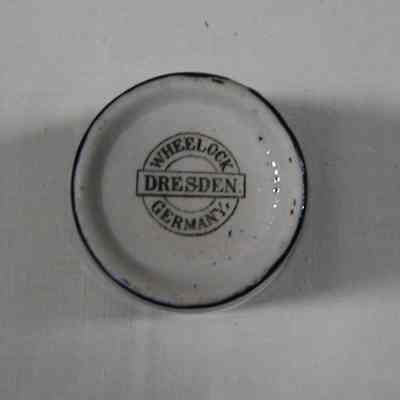 Cup with "Wisconsin State Prison at Waupun" on it.