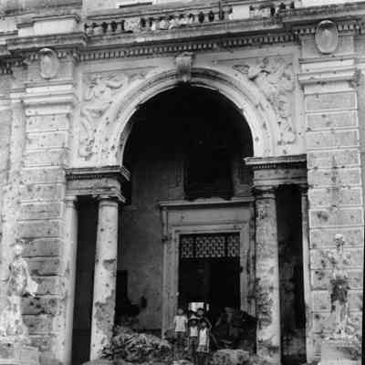 Doorway of wrecked building.