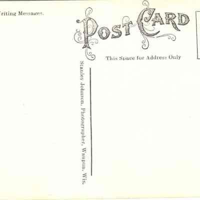 Back view of photo postcard by A.S. Johnson