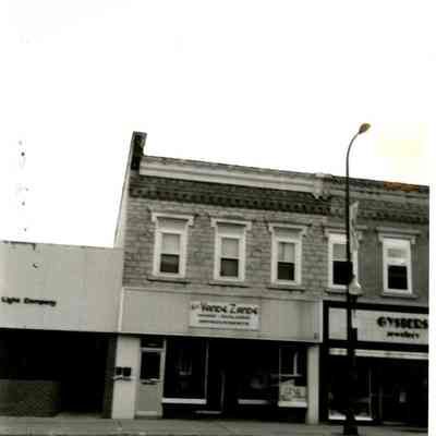 1993 photo of commercial block at 301-307 E. Main
