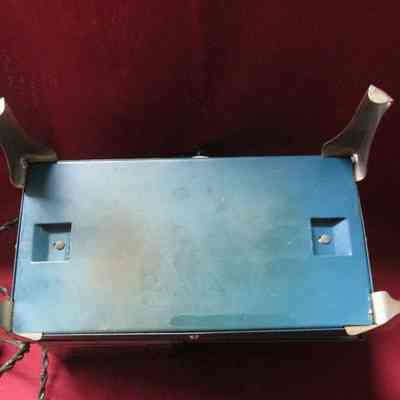 Bottom of hot plate showing 4 legs