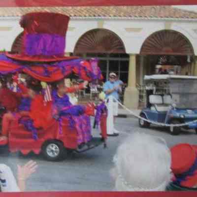 Red Hat Society float in Spanish Spring Parade