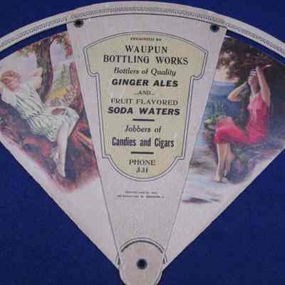 Front or back of opened hand held fan.