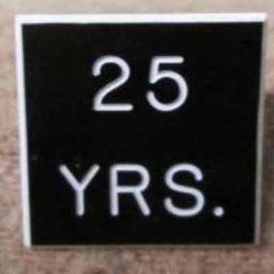 25 Yrs. service pin to E. Leinweber/Prison Guard