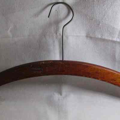 Back of wooden hanger from Chris Nielsen business