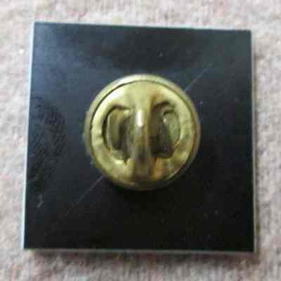 Back of 25 YRS. pin worn by E. Leinweber