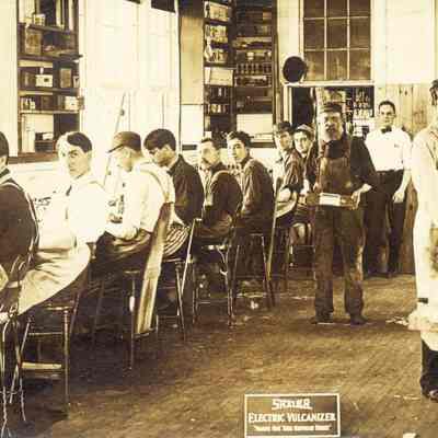 Postcard, Shaler, Electric Vulcanizer shop with eleven men