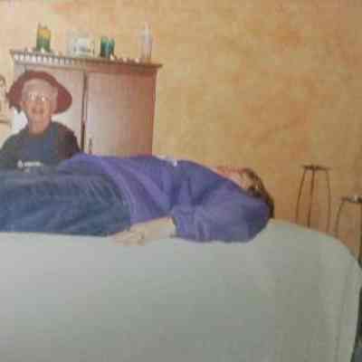 Tea Bags member on massage table.