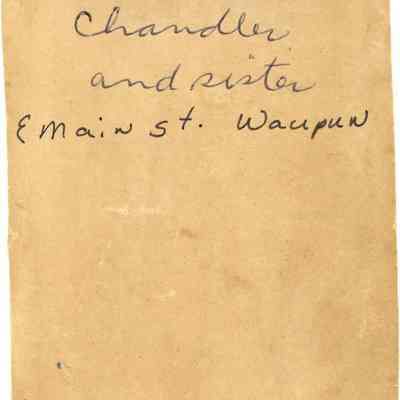 Back of photo of Annie Chandler and sister.