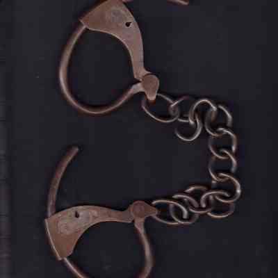 prisoner handcuffs: Origformat: Other