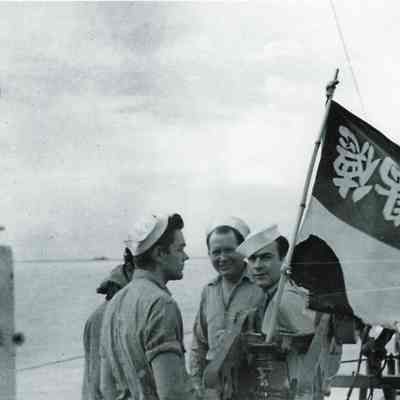 Sailors with flag
