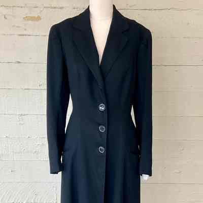 Full length fitted frock coat with high back vent