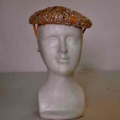 Sequined cocktail hat with star and leaf pattern in large paillettes on crown