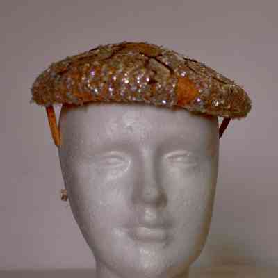 Sequined cocktail hat with star and leaf pattern in large paillettes on crown