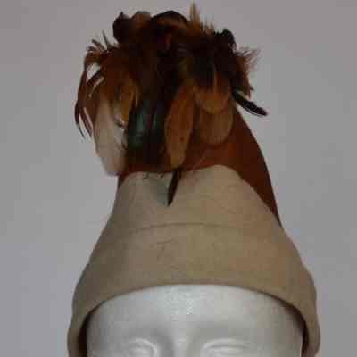 Felted Robin Hood style hat with brown ribbon and brown feathers at top