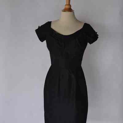 Taffeta sheath dress with scooped neck and short sleeves