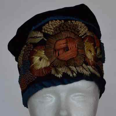 Velvet slouchy toque with multi color embroidered front