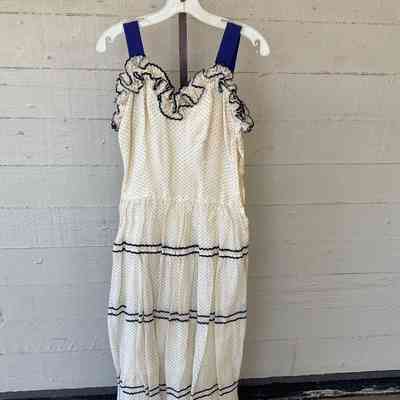 Dotted Swiss party dress with ruffled bodice edge