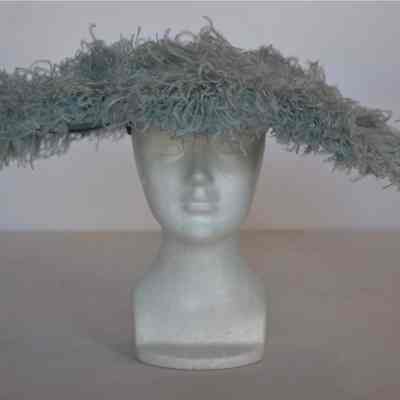 Wide brimmed velour picture hat with large plumes covering brim