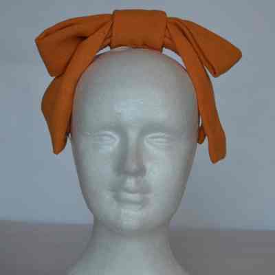 Wool crèpe bow headpiece on headband