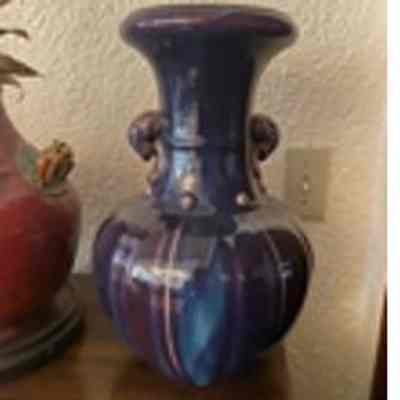Blue vase with elephant handles