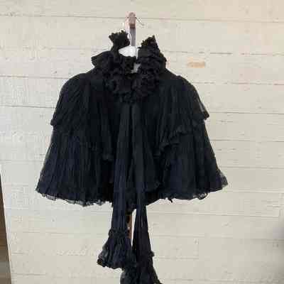 Black ruffled mesh and lace capelet